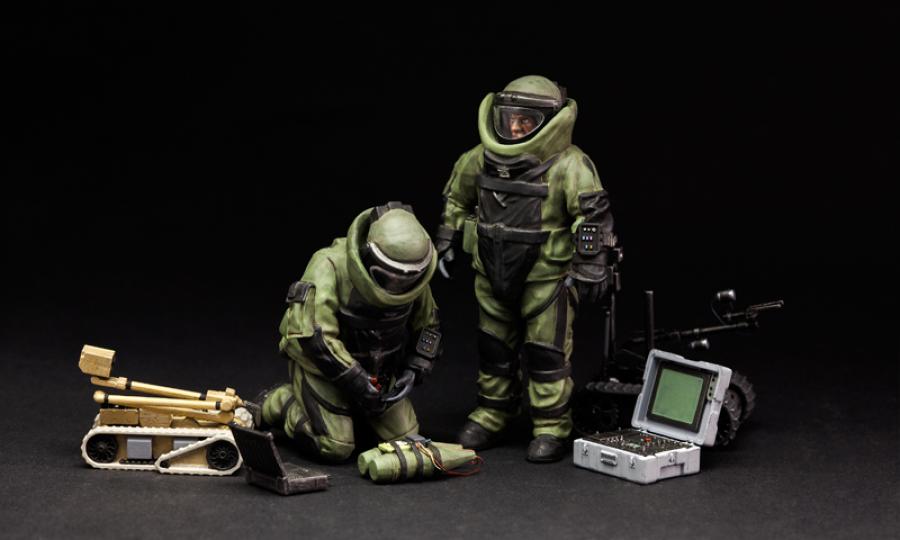 1:35 U.S. explosive ordnance disposal specialists and robot
